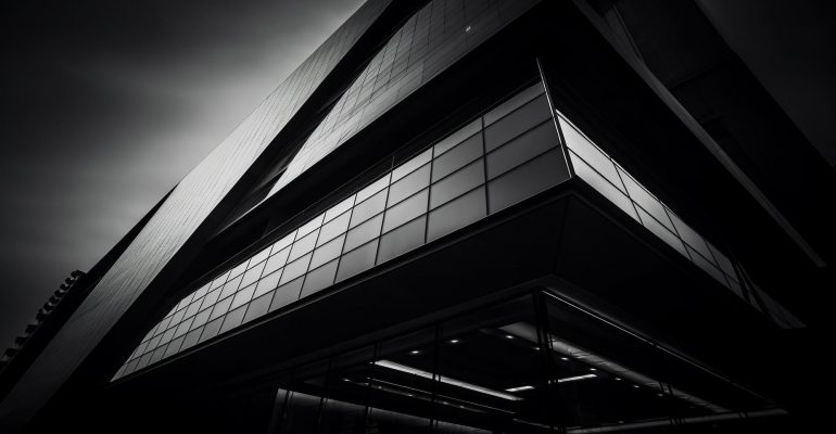 futuristic-skyscraper-steel-glass-illuminated-night-generated-by-ai